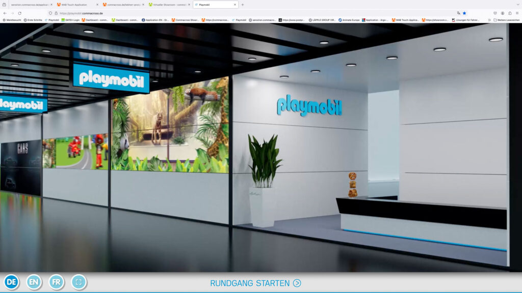 Empfangstheke im Virtuellen Showroom von Playmobil mit Sprachauswahl und Start Button